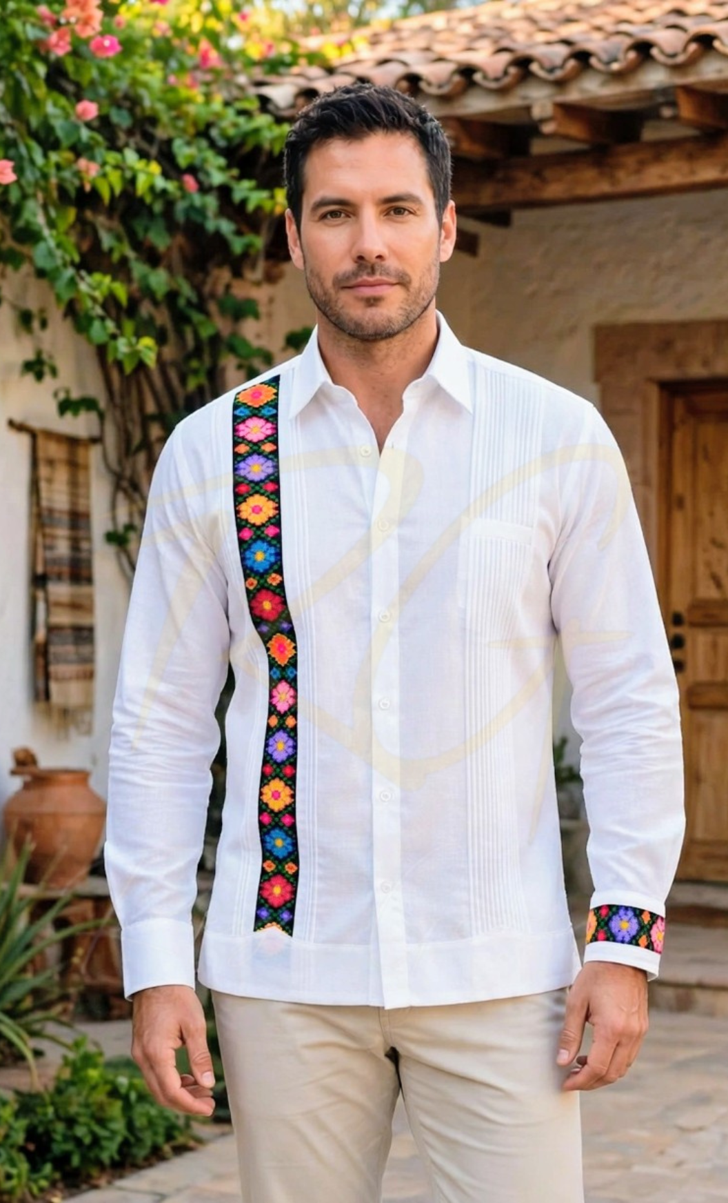 Guayabera en lino, con una tira bordada a mano en punto de cruz